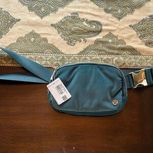 Lululemon Green Belt Bag with Gold Accents